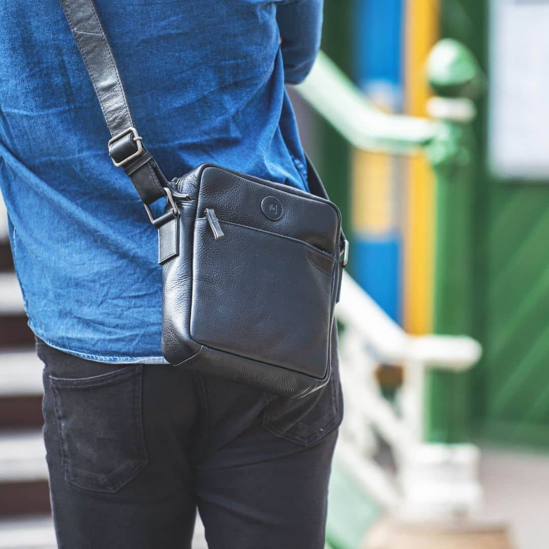 Black leather man bag flight bag.