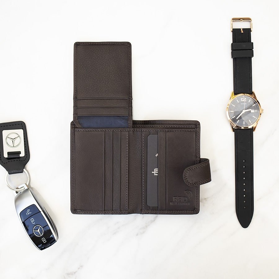 Brown leather wallet with a visible brand logo on a white background