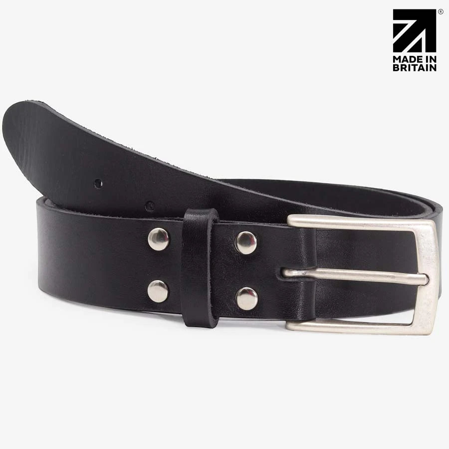 Close-up of a black 35mm leather belt with polished nickel pin buckle