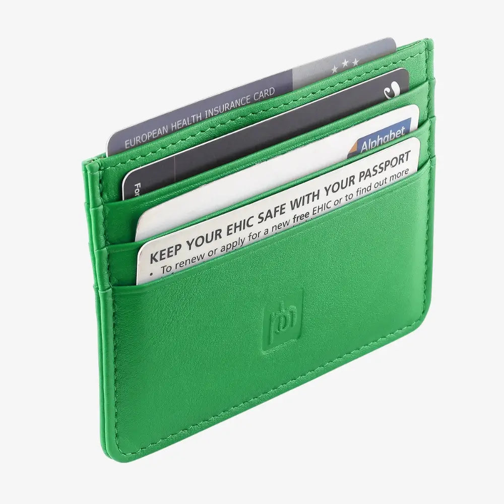 A green leather cardholder wallet shown open, holding several sample cards, on a light gray background.