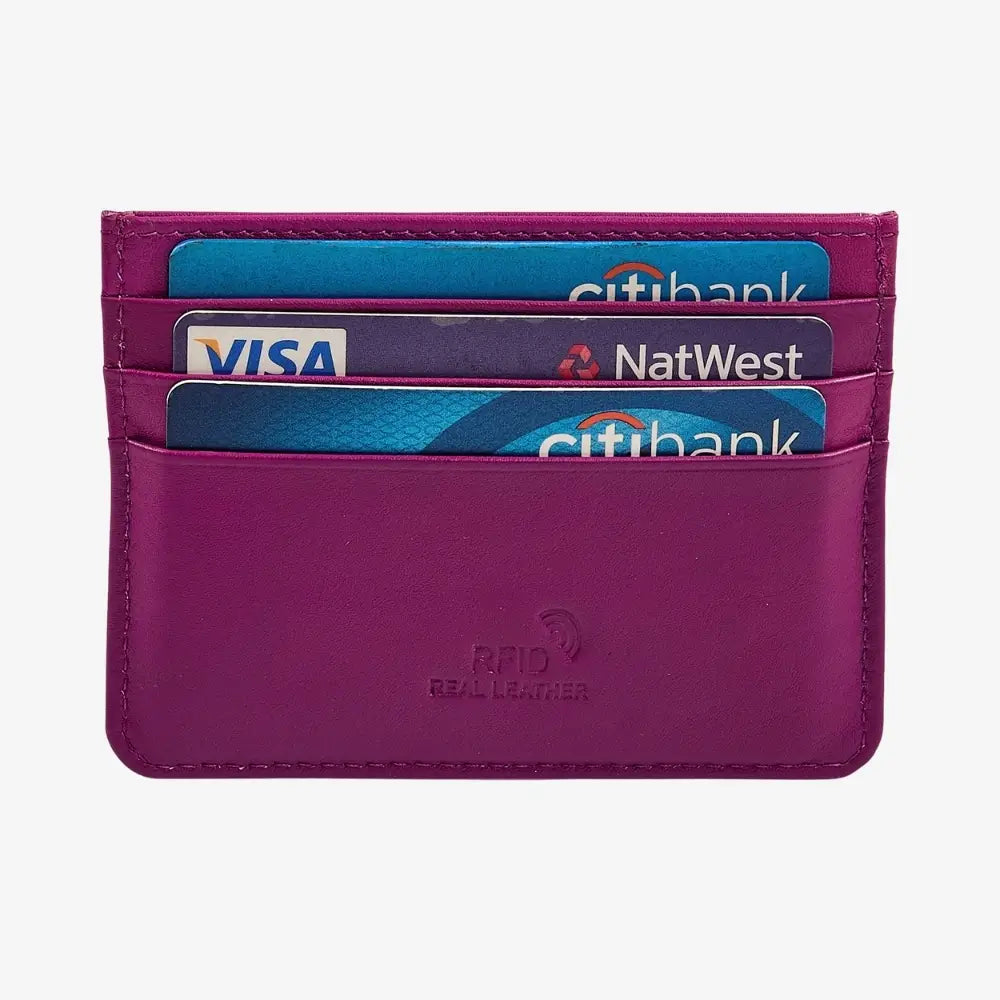 A fuchsia RFID cardholder wallet made of real leather, shown with four credit cards inserted (Visa, NatWest, Citibank) on a light gray background.