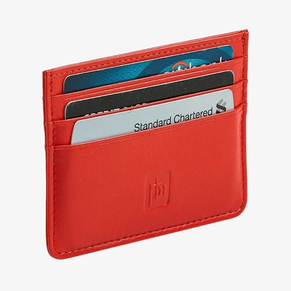 Side angle view of orange leather card holder