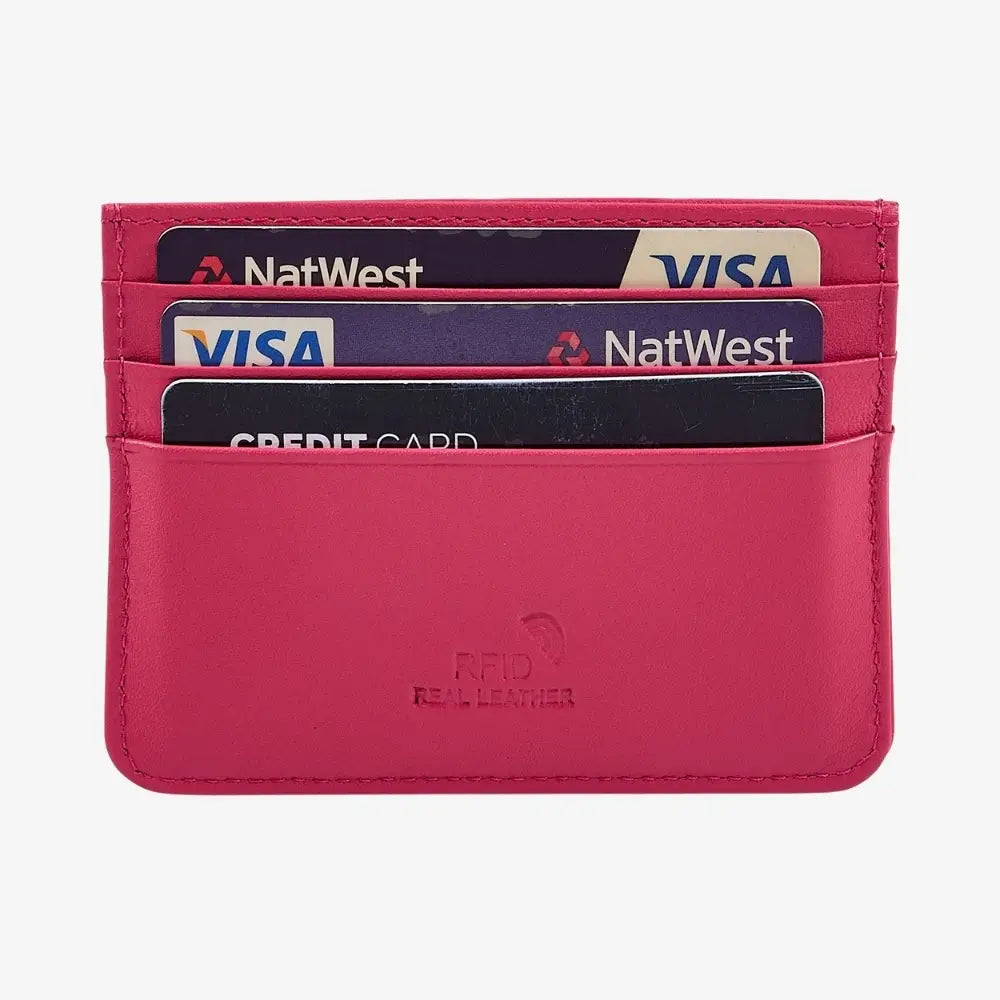Front view of Pink leather card holder with different credit cards inside it.