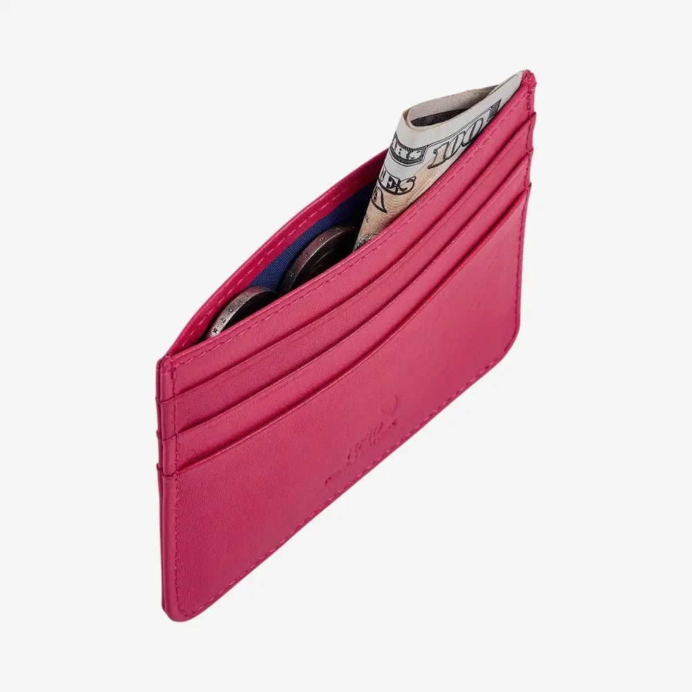 A pink leather card holder wallet shown open, containing card slots, cash, and coins, photographed on a clean white background.