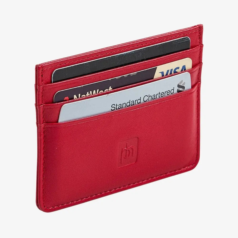 A red leather cardholder wallet with multiple cards inserted, featuring an embossed logo on the front and a light gray background.