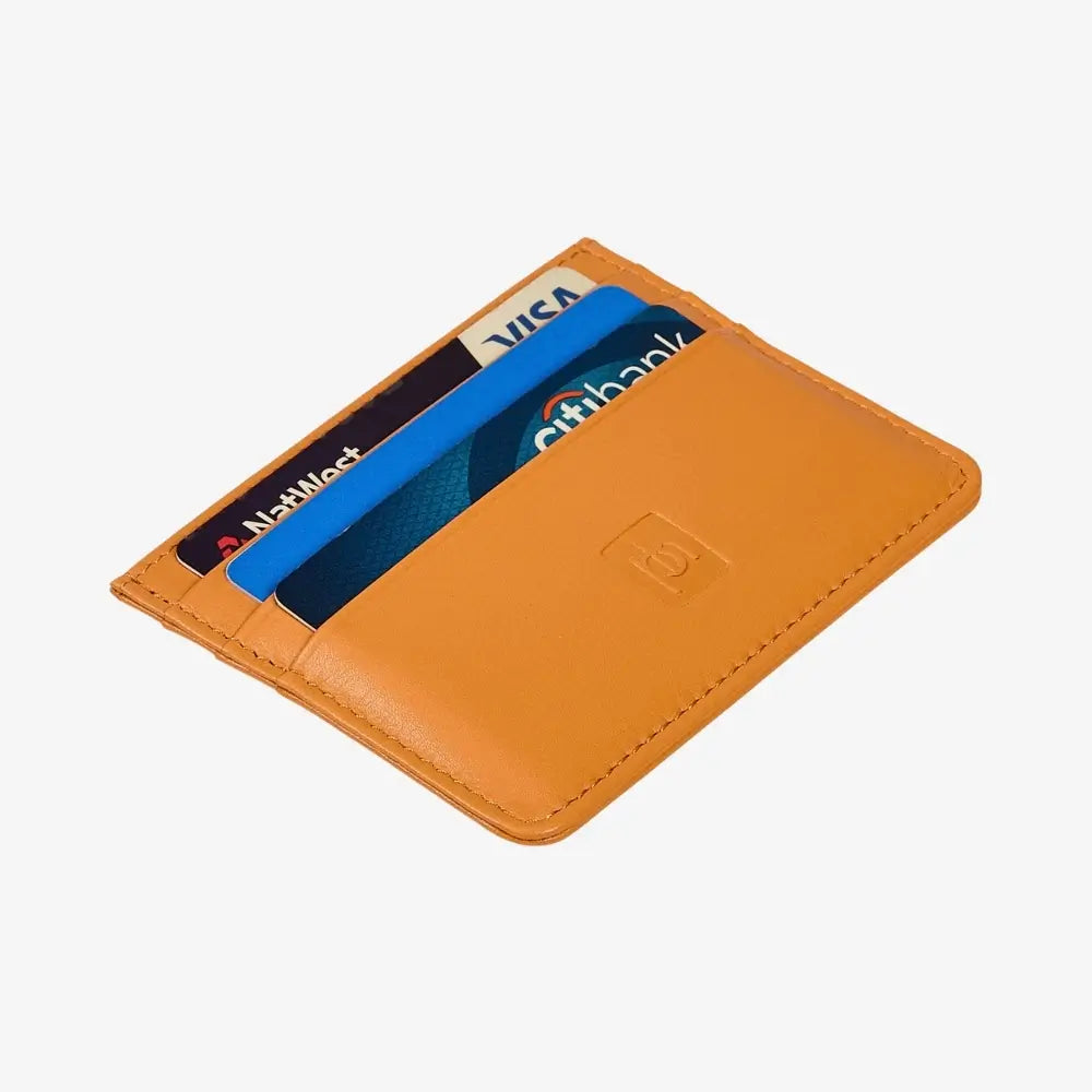 A slim, minimalist cardholder wallet in yellow leather, shown open with three cards inserted (a black NatWest card, a blue card, and a Citibank card). 