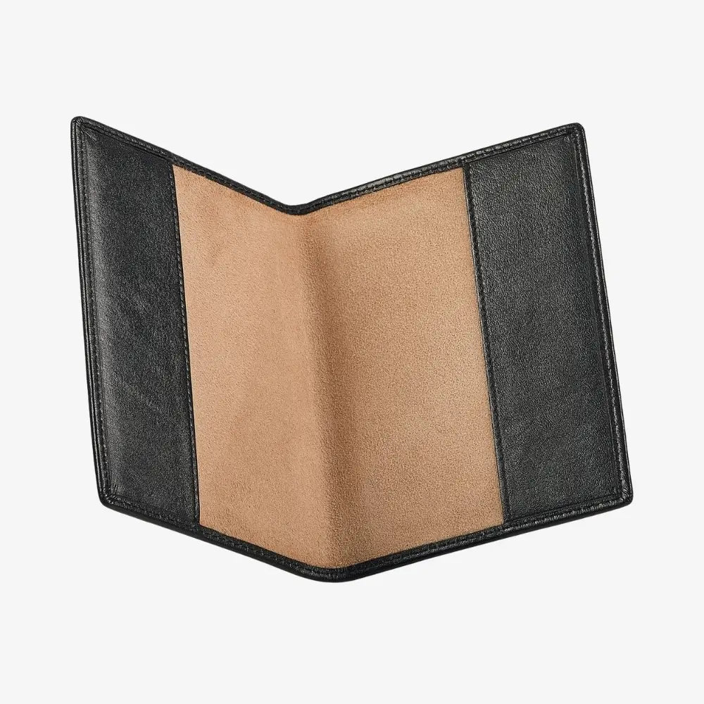A black leather passport cover or wallet shown open, featuring a wide tan suede-like center panel and black leather side panels, set against a plain light gray background.