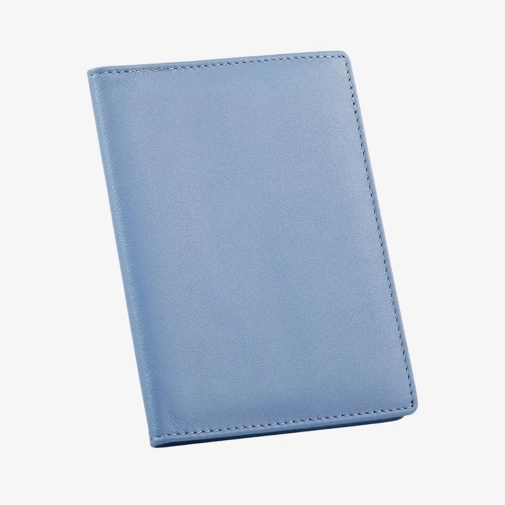 A blue leather passport cover shown closed at an angle on a plain white background.