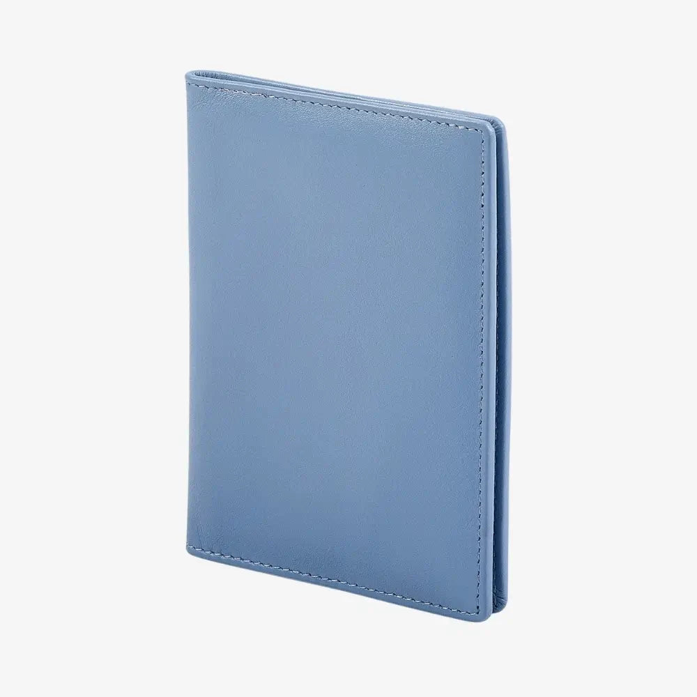 A blue leather passport cover  shown closed at a slight angle, photographed on a clean white background.