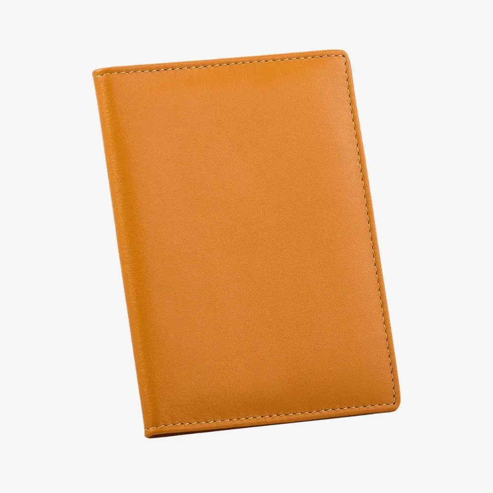 A slim, minimalist yellow leather passport cover with visible stitching along the edges, shown on a clean white background.