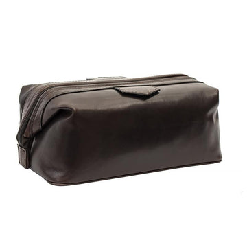 Brown leather toiletry bag on a white background