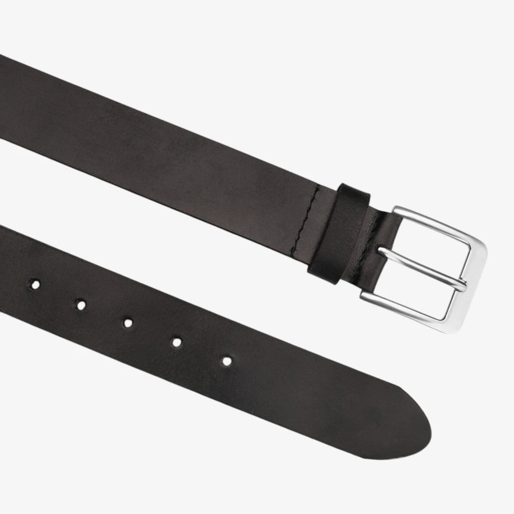 Top angle view of Black leather belt with a silver buckle on a white background