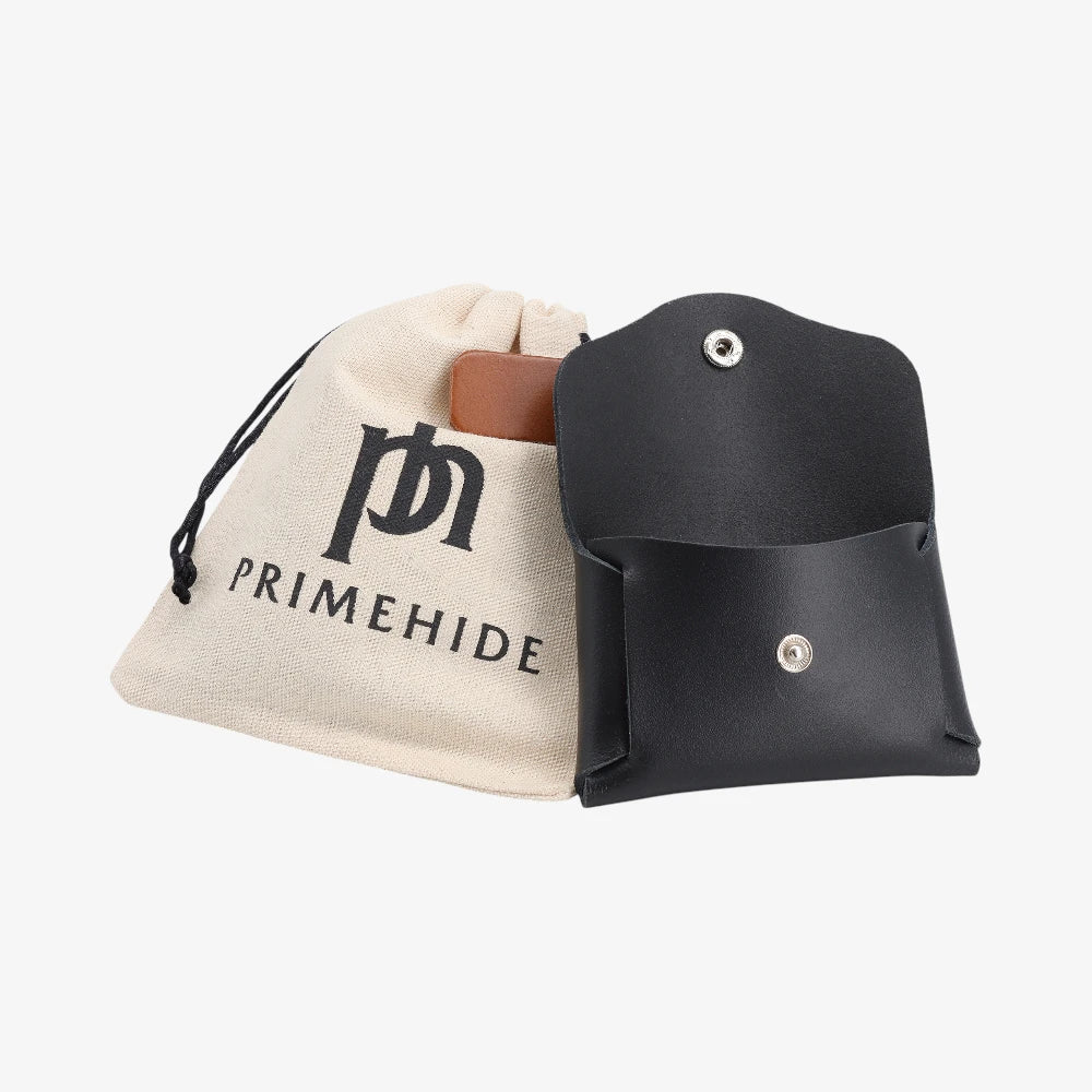 Black leather coin purse closed flap displayed with Primehide dust bag