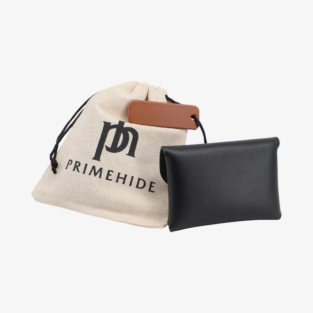 Black leather  coin purse back view with textured finish and branded pouch