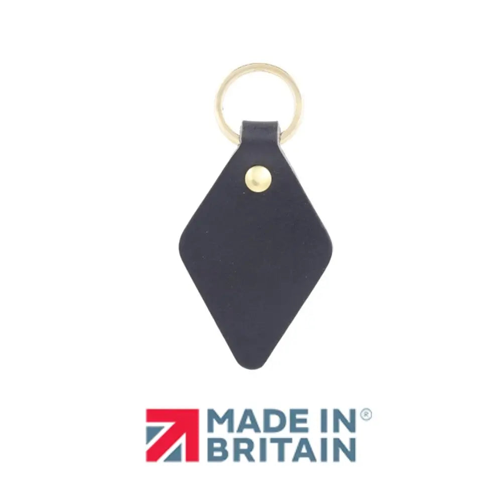 Black diamond-shaped keychain with gold ring on a white background, featuring 'Made in Britain' logo.