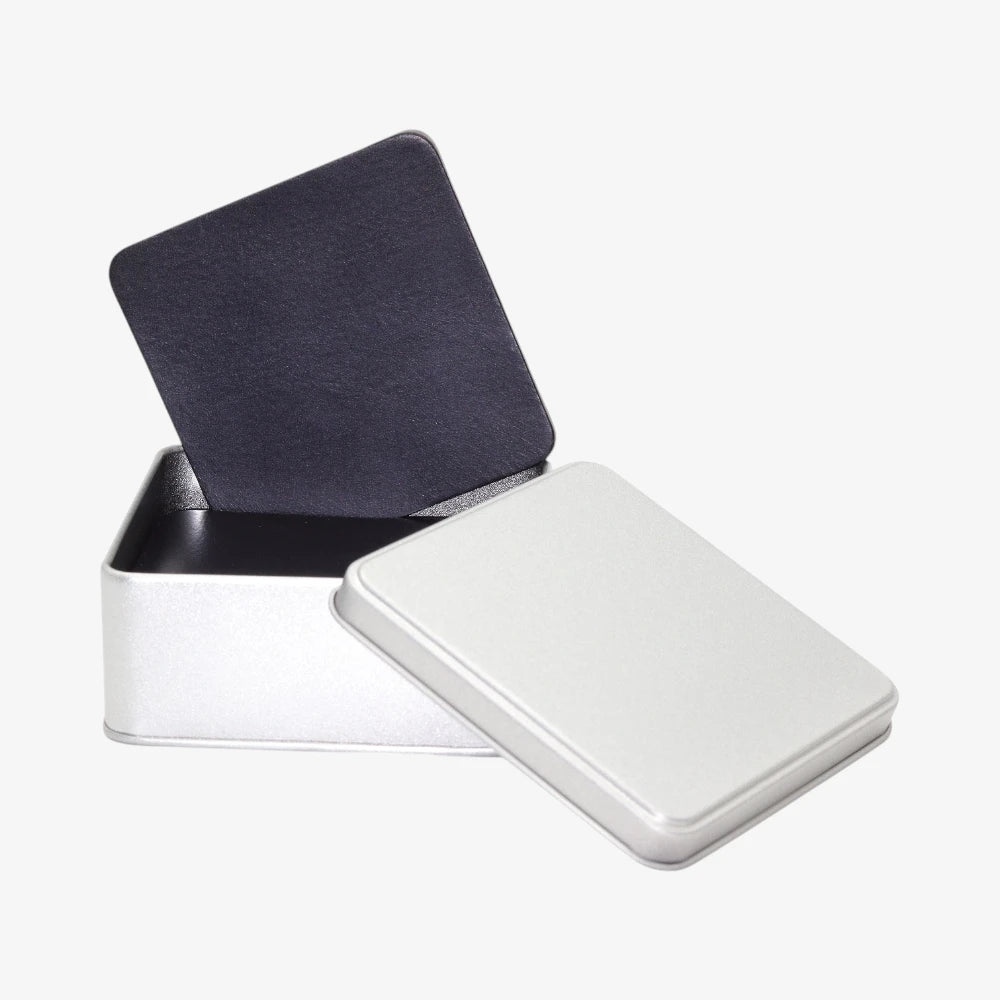 Luxury Black leather coasters for coffee table on a grey background