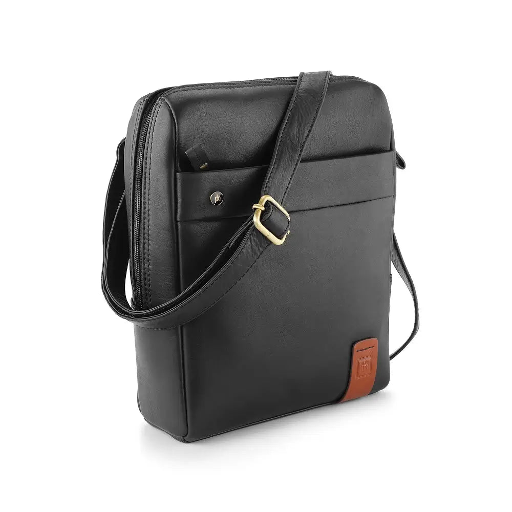 Black leather messenger bag with a gold buckle on a white background