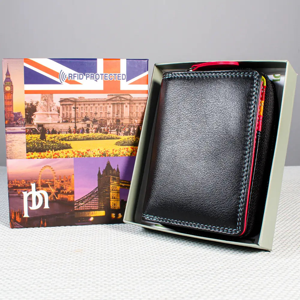 Black leather wallet with red stitching in a box featuring London landmarks and 'rfid protected' text.