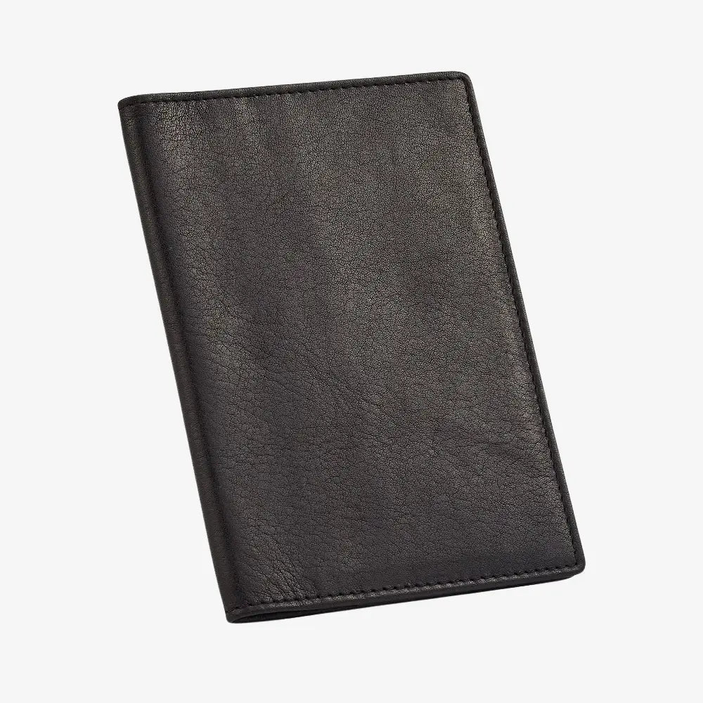 Black leather passport holder on a white background