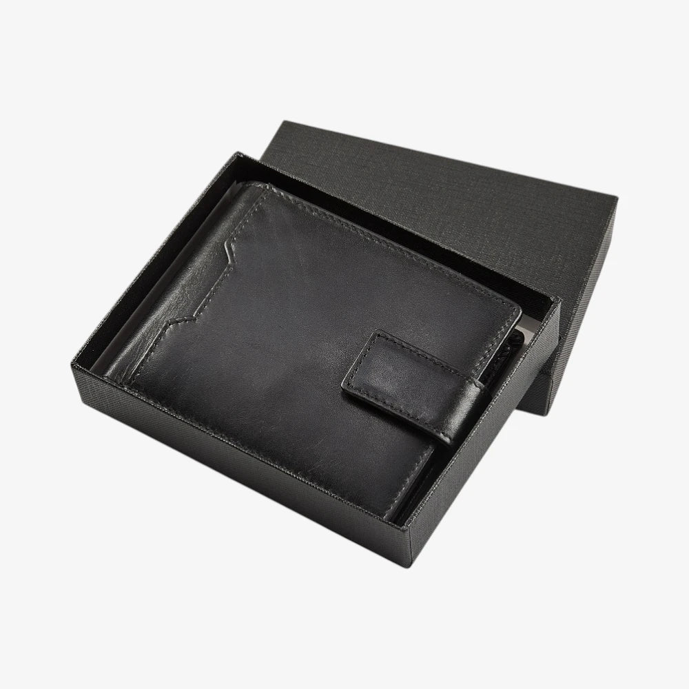 Black leather wallet in an open box on a white background