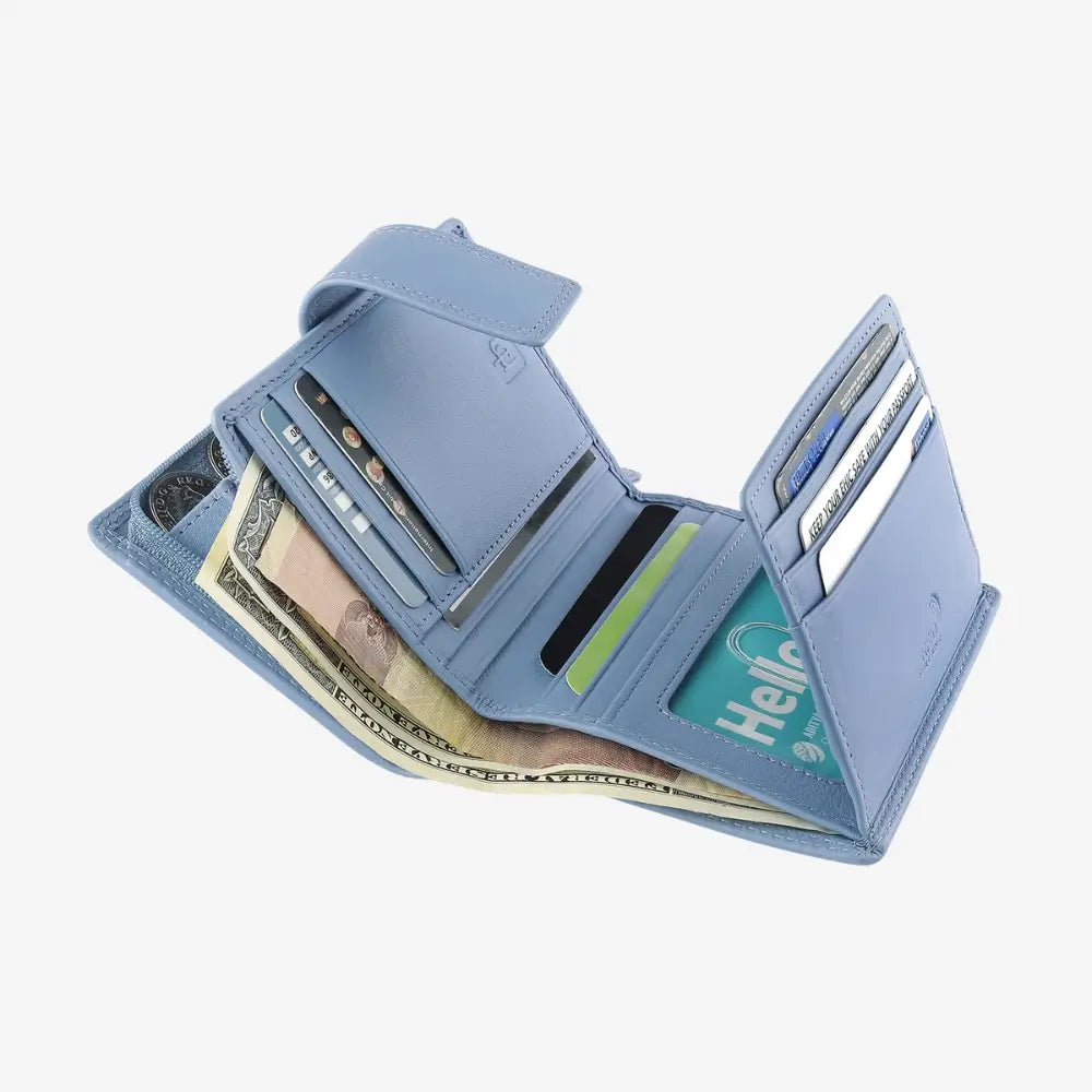 Blue wallet open to show cards, money, and a phone on a white background