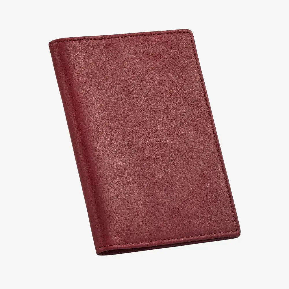Bordeaux leather passport holder on a white background