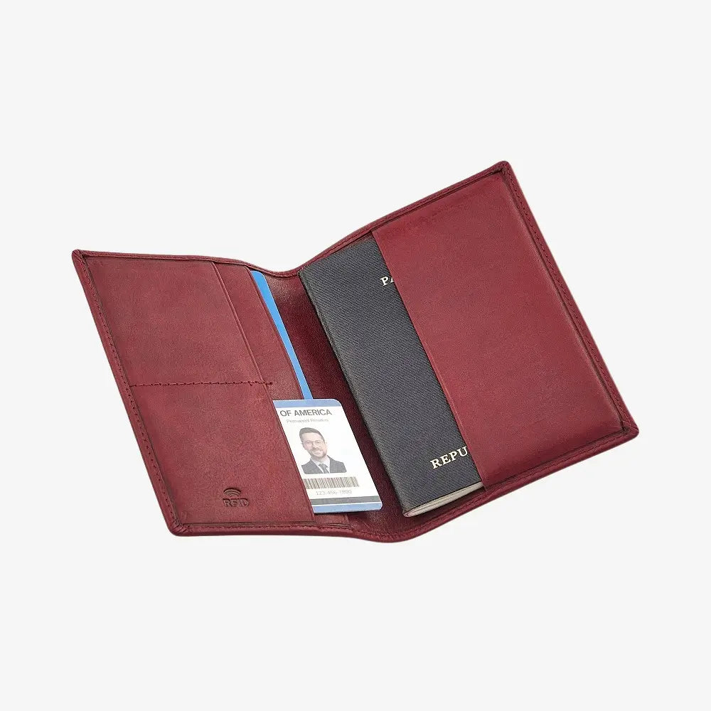 Bordeaux leather passport holder with a passport and card holder on a white background