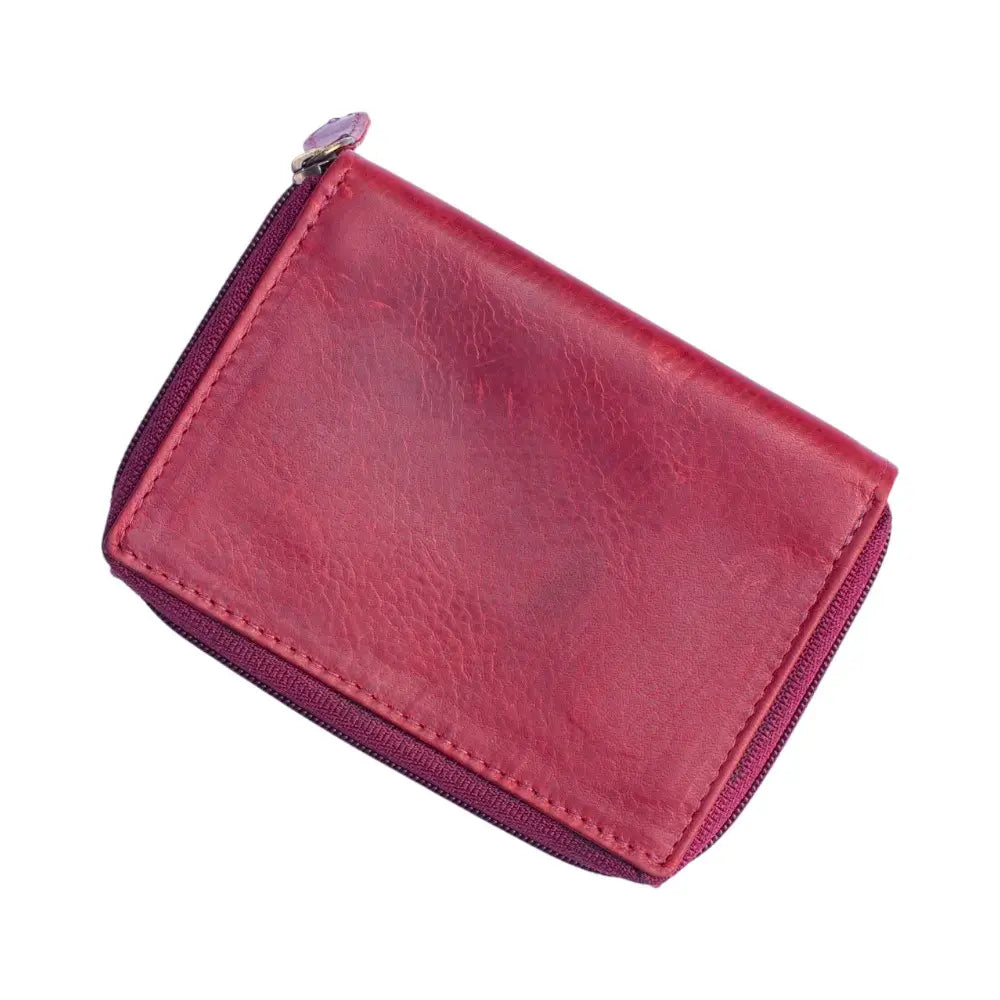 Bordeaux leather wallet with a zipper on a white background