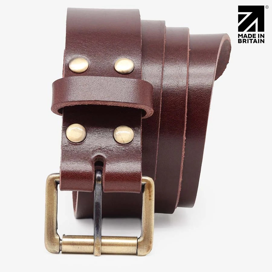 Coiled brown leather belt showing the refined gloss finish and buckle