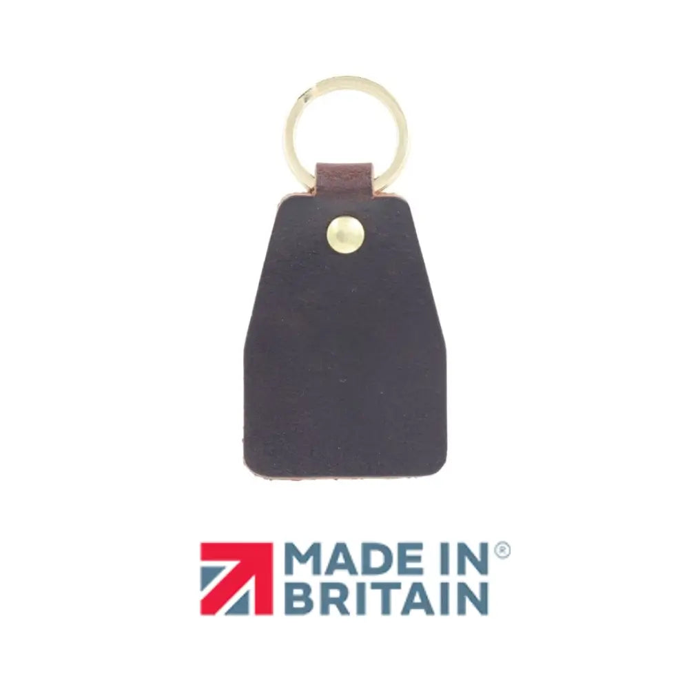 Brown  leather keychain with gold ring and 'Made in Britain' logo on a white background