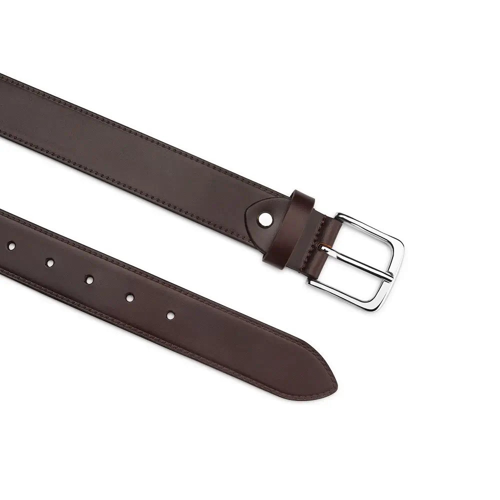 Brown leather belt with a silver buckle on a white background
