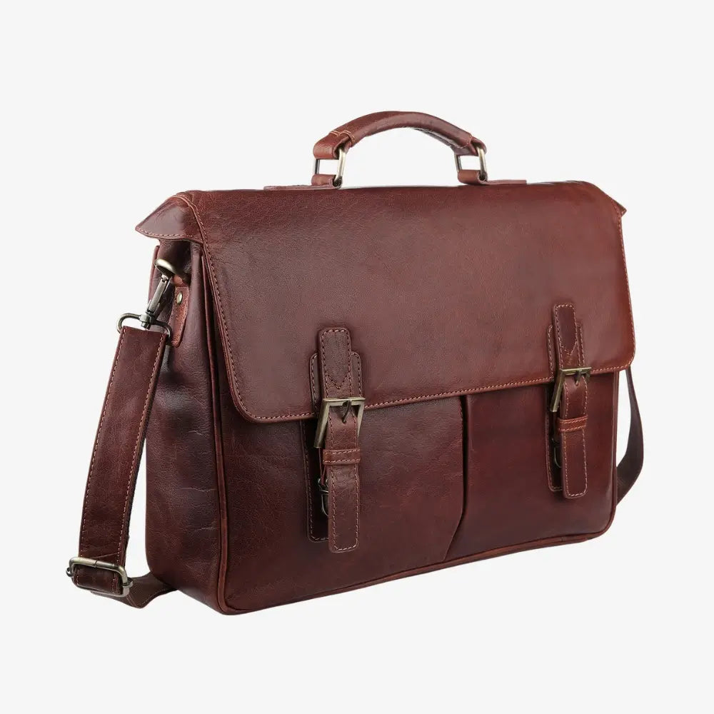 Brown leather laptop bag with shoulder strap on a white background