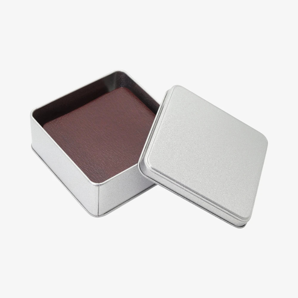 Silver rectangular box with a Full grain leather coaster set in brown on a white background
