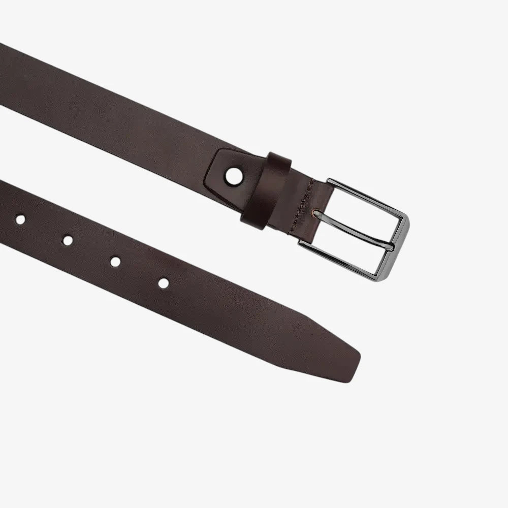 Top view of Brown leather belt with a silver buckle on a white background