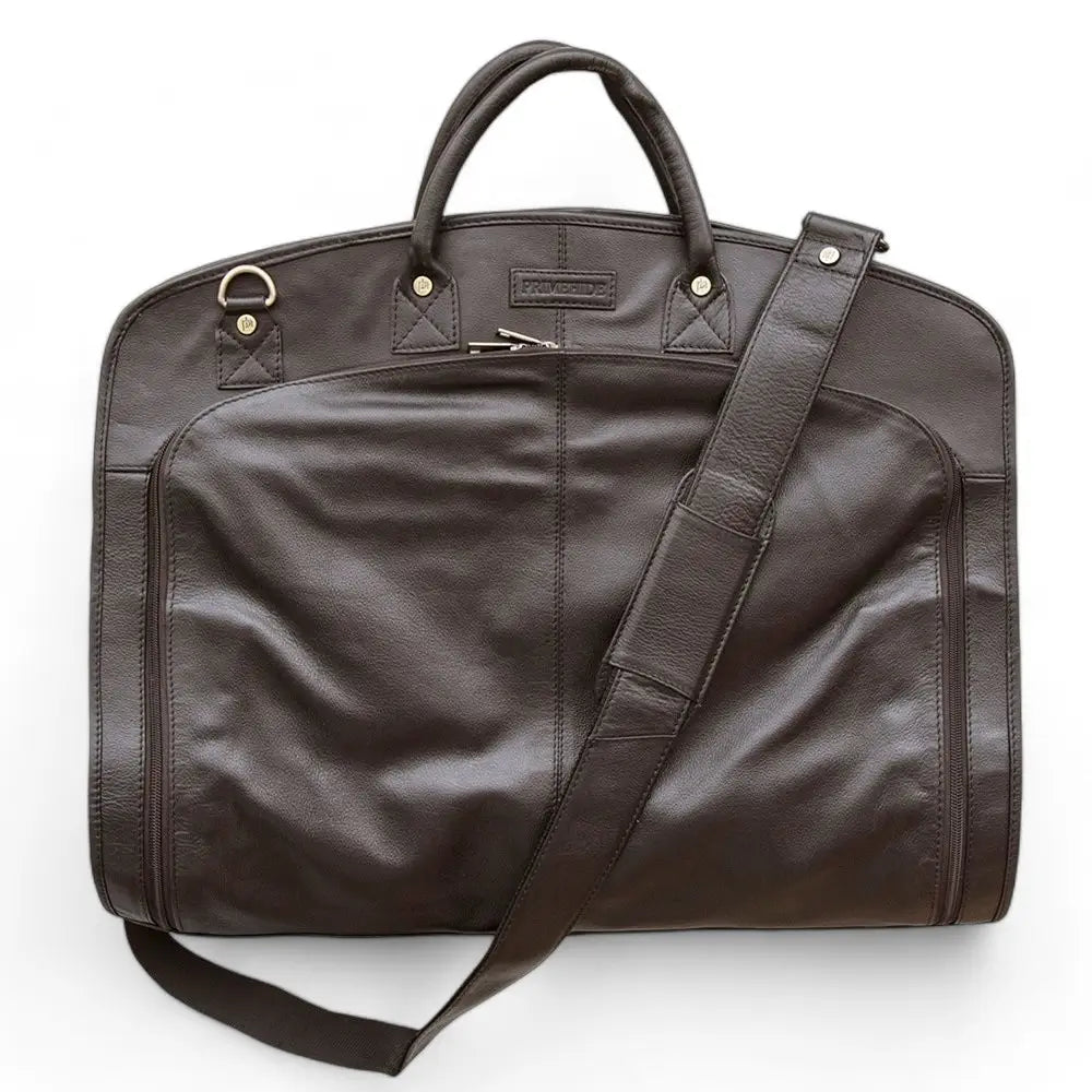 Brown garment carrier with a shoulder strap on a white background