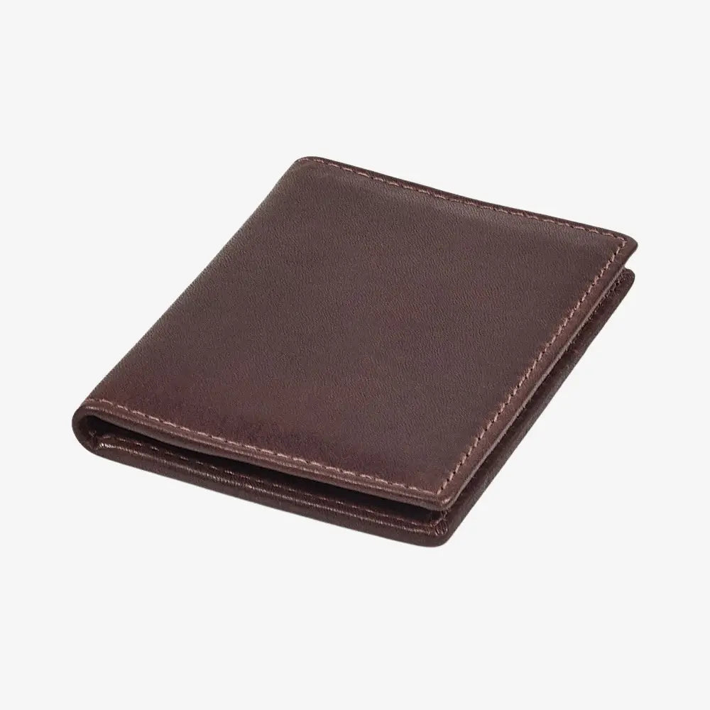 Top view of Brown leather card holder on a white background