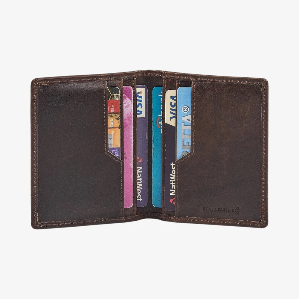Brown leather credit card holder with multiple cards inside on a white background