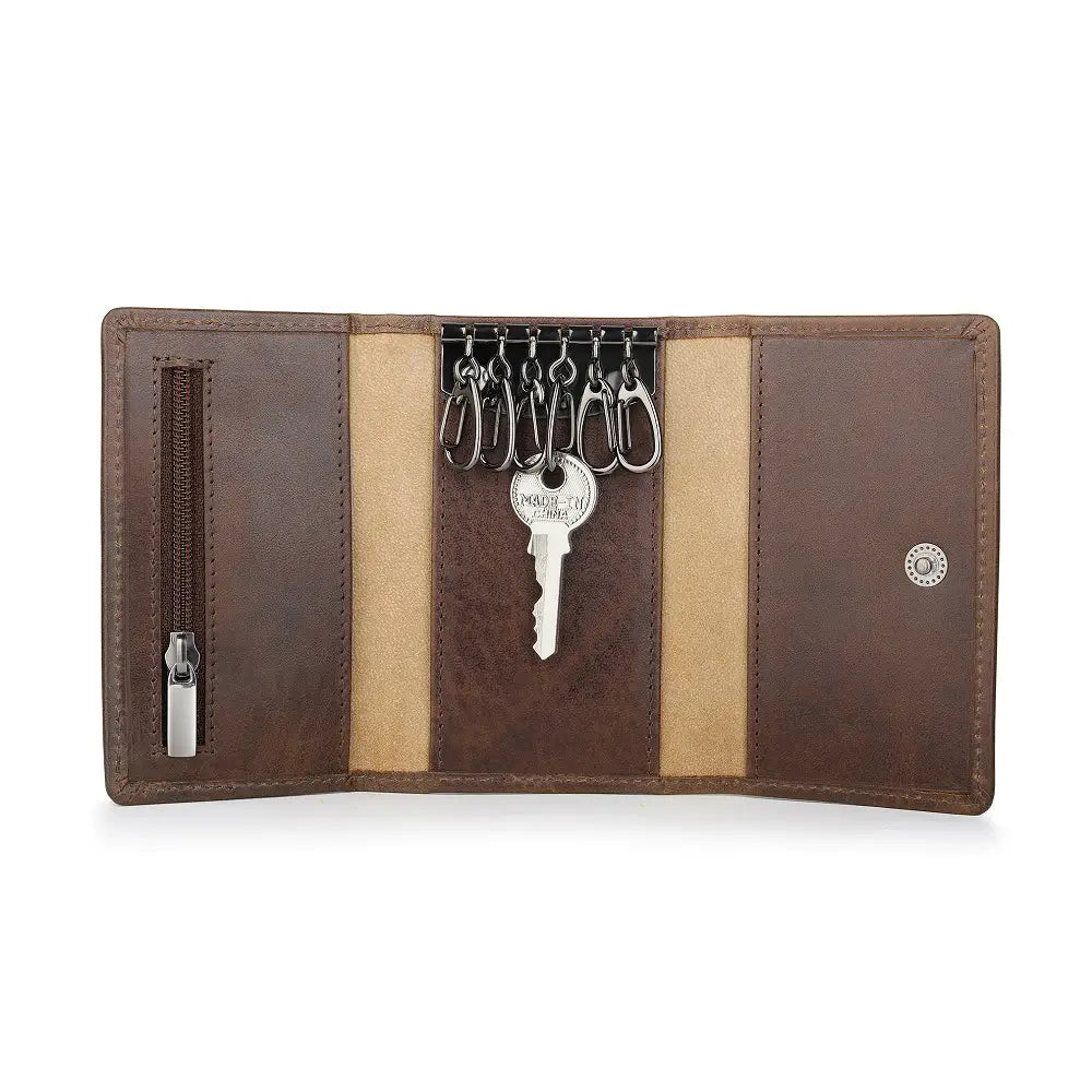Brown leather wallet with key holder on a white background