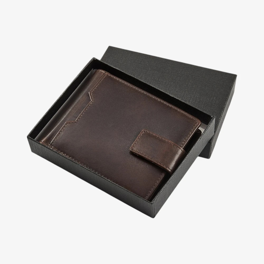 Brown leather wallet in a black box on a white background