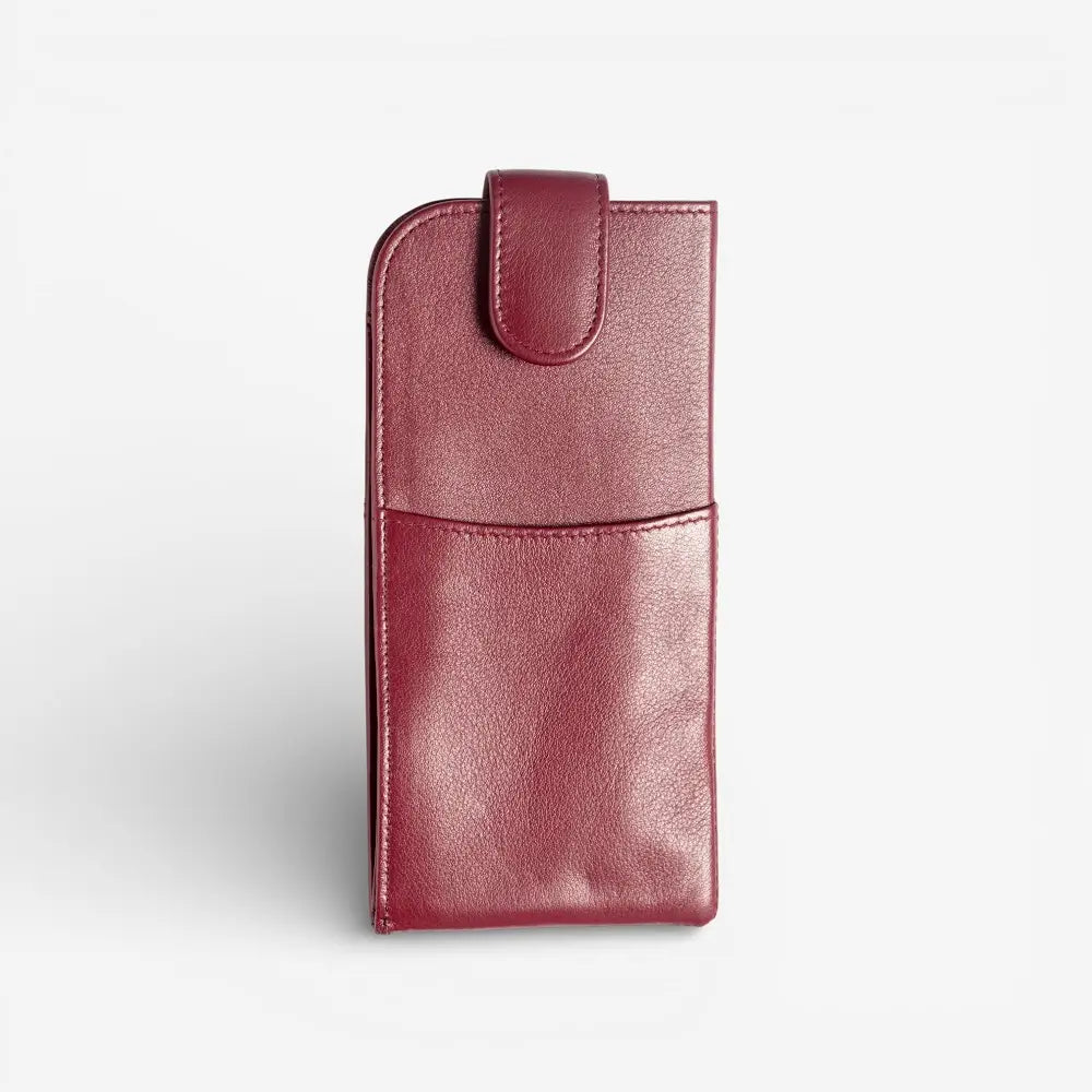 Burgundy leather glasses pouch on a light gray background