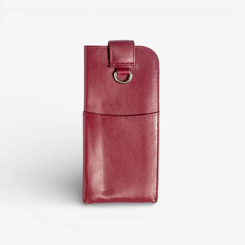 Burgundy leatherglasses pouch with a strap on a light gray background