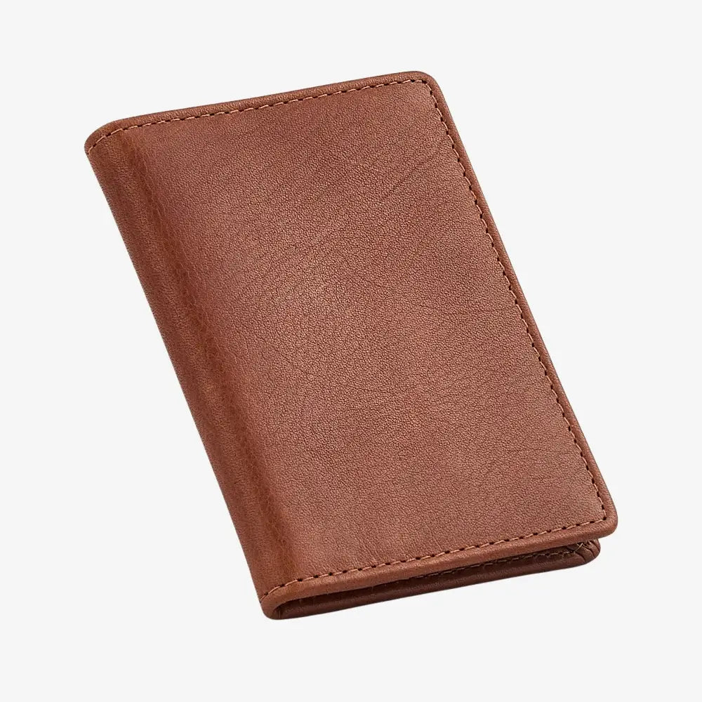 Chestnut leather card holder on a white background