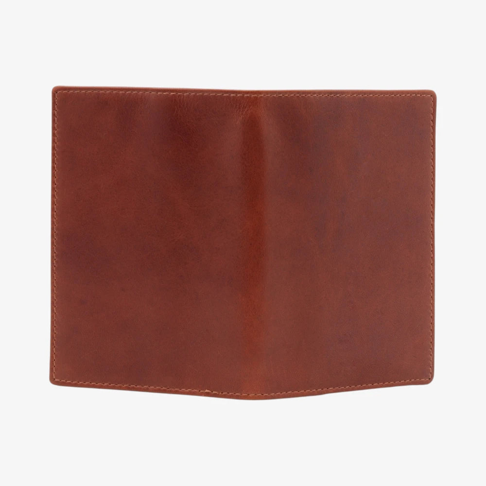 Back open view of Chestnut leather passport holder  on a white background