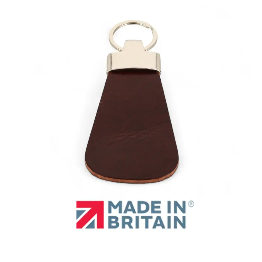 Chocolate leather key fob with gold ring on a white background, featuring 'Made in Britain' logo.
