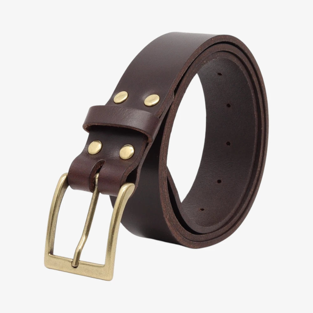 Chocolate leather belt with brass buckle on a white background
