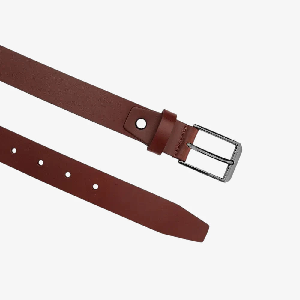 top angle view of Cognac leather belt with a silver buckle on a white background