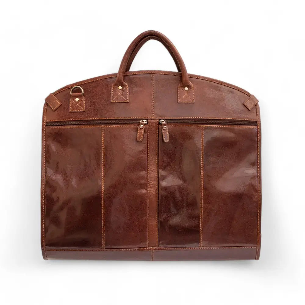 Cognac leather garment bag on a white background