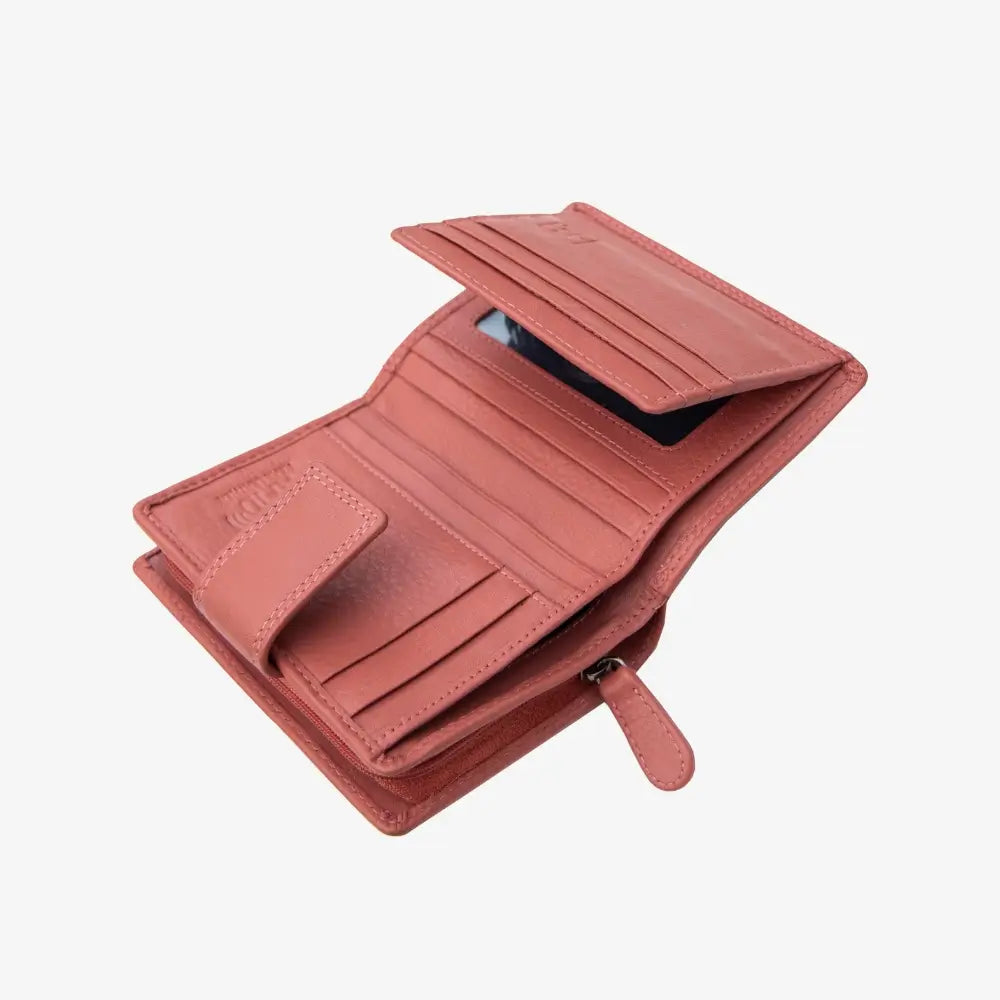 Open Dusty Rose leather wallet on a white background