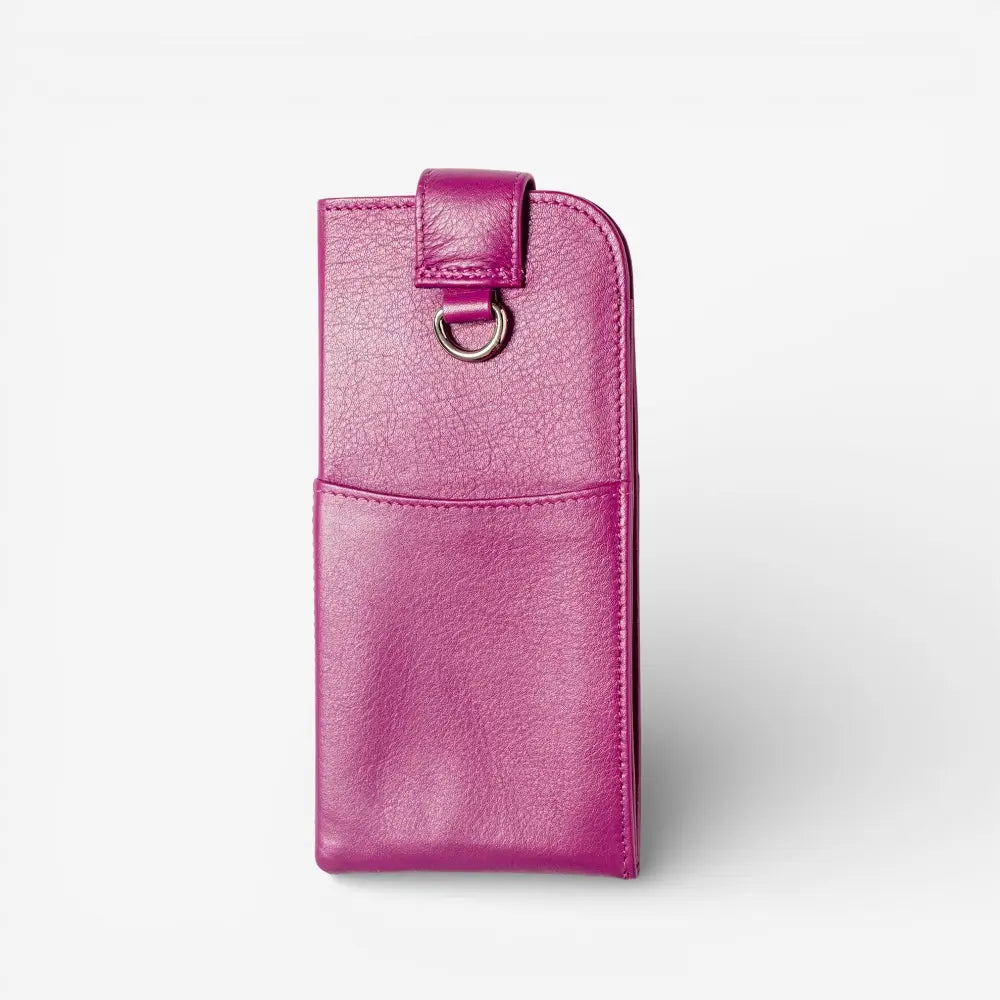 Fuchsia leather pouch with a strap on a white background
