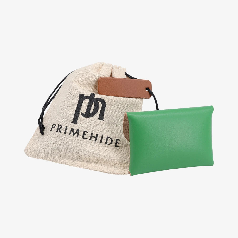 Back view of garden green leather coin purse with textured finish and branded pouch